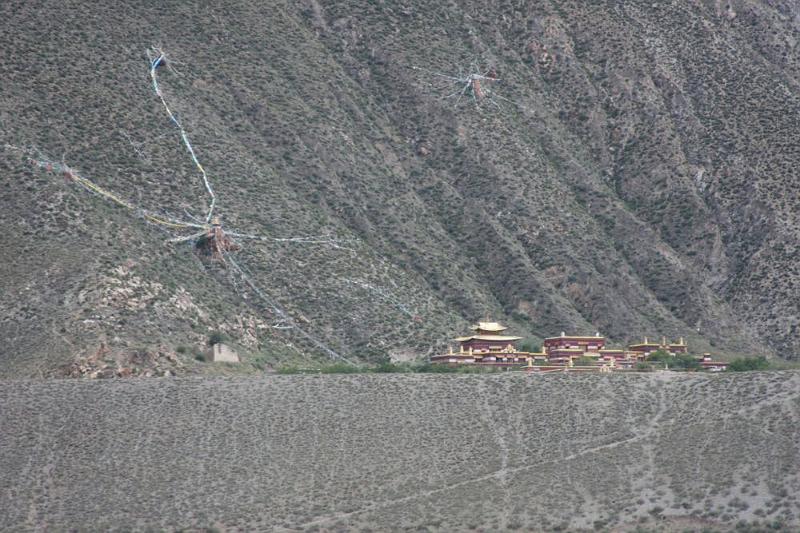 198 A great monastery above the river bank.jpg